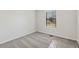 Well-lit bedroom featuring carpet, neutral walls, and a window for natural light at 2958 Forelock Sw Pl, Marietta, GA 30064