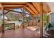 Spacious covered porch featuring wood ceiling and ample space for outdoor seating at 2958 Forelock Sw Pl, Marietta, GA 30064