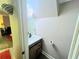 Powder room with wood cabinet vanity, white sink, mirror, neutral walls, and a toilet paper roll at 385 Ralph Mcgill Ne Blvd # D, Atlanta, GA 30312
