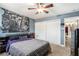 Bedroom with an overhead ceiling fan, art pieces, and double closets at 385 Ralph Mcgill Ne Blvd # D, Atlanta, GA 30312
