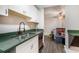 Kitchen featuring white cabinets and green countertops at 385 Ralph Mcgill Ne Blvd # D, Atlanta, GA 30312