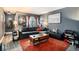 Stylish living room with a large couch, warm rug, and natural light, perfect for relaxation and entertaining at 385 Ralph Mcgill Ne Blvd # D, Atlanta, GA 30312
