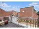 Exterior patio featuring a steel railing with a clear view of the surrounding buildings and greenery at 385 Ralph Mcgill Ne Blvd # D, Atlanta, GA 30312