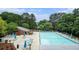 Aerial view of a community pool surrounded by trees and greenery, providing a serene retreat at 385 Ralph Mcgill Ne Blvd # D, Atlanta, GA 30312