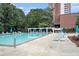 Community pool with lounge chairs, umbrellas, and a relaxing atmosphere at 385 Ralph Mcgill Ne Blvd # D, Atlanta, GA 30312