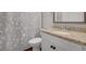 Bathroom featuring a shower with a shower curtain and granite countertops at 541 Glen Abbey Se Cir, Mableton, GA 30126