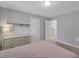 Cozy bedroom with neutral walls, dresser, and plush carpet at 541 Glen Abbey Se Cir, Mableton, GA 30126