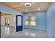 Bedroom with blue walls and wood plank ceiling at 541 Glen Abbey Se Cir, Mableton, GA 30126