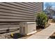 A Generac generator sits adjacent to the home's exterior wall with sidewalk in view at 541 Glen Abbey Se Cir, Mableton, GA 30126