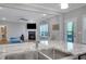 Modern kitchen featuring a large island with granite countertops and stainless steel sink at 541 Glen Abbey Se Cir, Mableton, GA 30126
