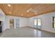 Bright open living area featuring concrete floors and a seamless connection to the outdoors at 541 Glen Abbey Se Cir, Mableton, GA 30126