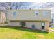 Two-story home features a well-maintained lawn and siding at 5415 Tracey Dr, Stone Mountain, GA 30088