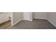 View of the basement featuring neutral gray carpeted floors and light gray walls at 5415 Tracey Dr, Stone Mountain, GA 30088