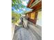 Exterior shot from the deck of the brick apartment building highlighting the wooden railing and steps at 208 Doane St, Atlanta, GA 30315