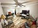 Living room featuring textured ceilings, unique flooring and neutral colored walls at 208 Doane St, Atlanta, GA 30315