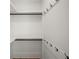 Walk-in closet with custom shelving and hanging rods for optimal storage at 431 Clifton Ne Rd, Atlanta, GA 30307