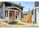 Charming two-story home with inviting front porch, professional landscaping, and private driveway at 431 Clifton Ne Rd, Atlanta, GA 30307