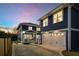 Beautiful two-story home featuring a private driveway and an attached two-car garage at 431 Clifton Ne Rd, Atlanta, GA 30307