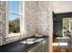 Modern kitchen features a stylish backsplash and a window view, enhancing the bright and airy space at 431 Clifton Ne Rd, Atlanta, GA 30307