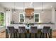 Kitchen island with seating, pendant lighting, and high-end appliances, perfect for cooking and casual dining at 431 Clifton Ne Rd, Atlanta, GA 30307