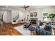 Spacious living room with hardwood floors, fireplace, and staircase access, ideal for entertaining and Gathering at 431 Clifton Ne Rd, Atlanta, GA 30307