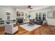 Bright living room with a fireplace, hardwood floors, and a comfortable seating area, perfect for relaxation at 431 Clifton Ne Rd, Atlanta, GA 30307