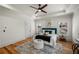 Comfortable main bedroom features tray ceiling, hardwood floors and soft natural light at 431 Clifton Ne Rd, Atlanta, GA 30307