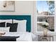 Close up of the main bedroom with stylish decor, large window, and comfortable furnishings at 431 Clifton Ne Rd, Atlanta, GA 30307