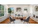 Sunlit home office with hardwood floors, neutral decor, built-in shelving, and large windows offering pleasant views at 431 Clifton Ne Rd, Atlanta, GA 30307