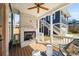 Cozy porch featuring a brick fireplace and comfortable seating, perfect for outdoor enjoyment at 431 Clifton Ne Rd, Atlanta, GA 30307
