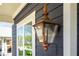 Close-up of an elegant exterior gas lantern adding charm to the home's facade at 431 Clifton Ne Rd, Atlanta, GA 30307