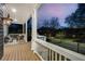 Cozy front porch featuring outdoor seating and a peaceful neighborhood view at 431 Clifton Ne Rd, Atlanta, GA 30307