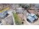 Bird's eye view of upscale homes nestled among the trees, each with a unique architectural design and private driveway at 8498 Colony Club Dr, Alpharetta, GA 30022