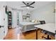 A bedroom features hardwood floors, natural light, and a desk at 8498 Colony Club Dr, Alpharetta, GA 30022