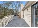 Wide exterior deck with stainless steel heater offers space for entertaining and outdoor relaxation at 8498 Colony Club Dr, Alpharetta, GA 30022