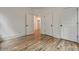 Well-lit bedroom with hardwood floors and multiple entryways at 2175 James Aly, Atlanta, GA 30345
