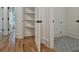 Hallway leading to laundry area with built-in shelving at 2175 James Aly, Atlanta, GA 30345