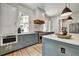 Modern kitchen with built in stainless oven, custom cabinets and stainless appliances at 2175 James Aly, Atlanta, GA 30345