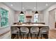 Bright kitchen with a marble backsplash, stainless appliances, and a large island at 2175 James Aly, Atlanta, GA 30345