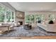 Bright and airy living room with a fireplace, large windows, and stylish accents at 2175 James Aly, Atlanta, GA 30345