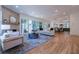 Spacious living room with a fireplace, large windows, and contemporary decor at 2175 James Aly, Atlanta, GA 30345