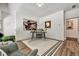 Office with a neutral color palette features a black table and modern art at 2175 James Aly, Atlanta, GA 30345