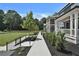 Beautiful townhomes with landscaped yards, blue siding, and white trim at 2175 James Aly, Atlanta, GA 30345