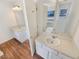Bright bathroom with dual sinks, and a soaking tub at 2917 Yukon Nw Trl, Acworth, GA 30101