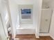 Bathroom featuring a tub with window view and a glass door shower at 2917 Yukon Nw Trl, Acworth, GA 30101