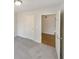 Spacious bedroom featuring carpeted floors and an open doorway that leads to another room at 2917 Yukon Nw Trl, Acworth, GA 30101