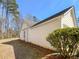Exterior side view of single-story home with lush lawn and landscaping at 2917 Yukon Nw Trl, Acworth, GA 30101