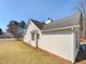 Exterior side view of single-story home with lush lawn at 2917 Yukon Nw Trl, Acworth, GA 30101