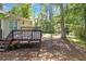 Outdoor deck, steps to backyard with beautiful trees at 4690 Big Valley Ct, Stone Mountain, GA 30083