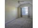 Bedroom with large window, neutral carpet and ceiling fan at 104 Oak Bend Dr, Stockbridge, GA 30281